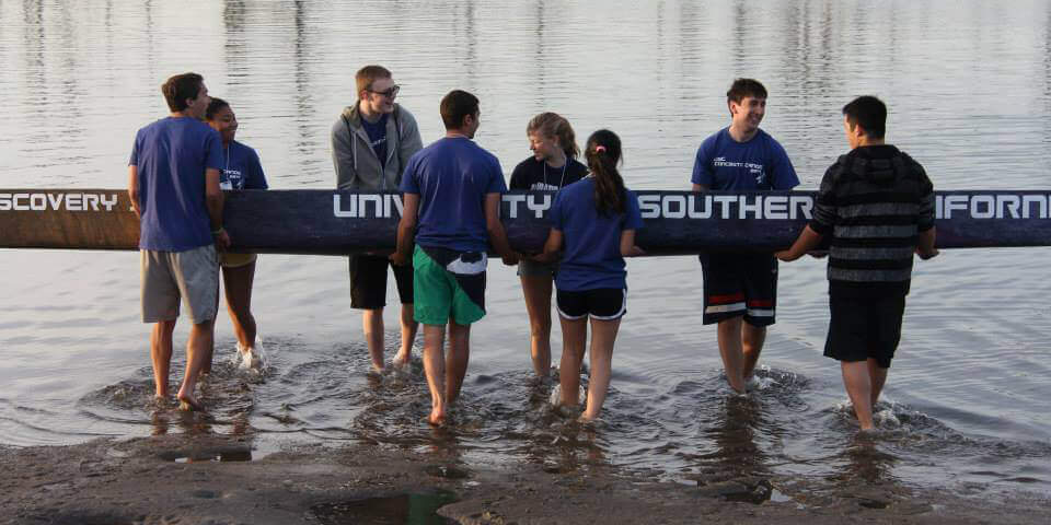 Photograph of ASCE carrying a canoe